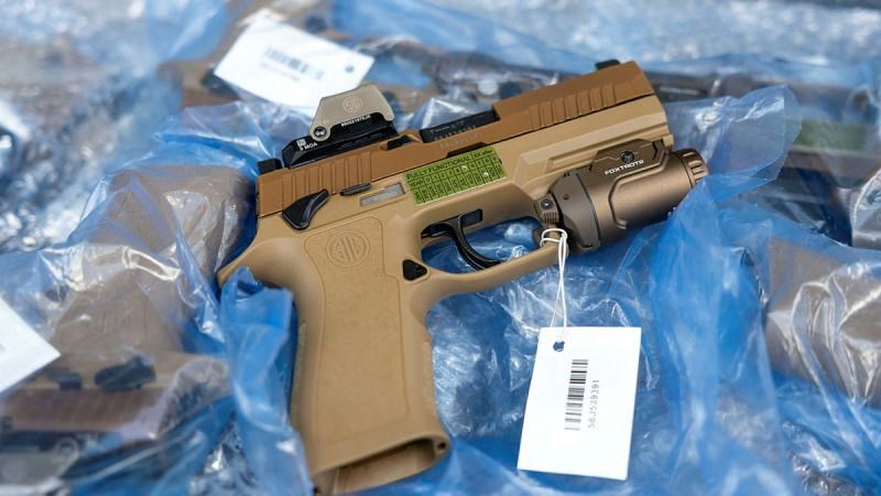 New ADF Pistol Unveiled The ADF's newest sidearm, the F9 pistol Corporal Janet Pan  &copy;