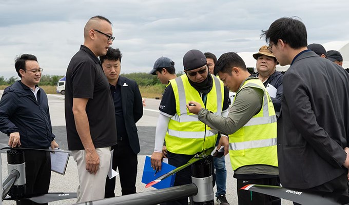 1st Urban Sandbox Human-Carrying Flight of Pilotless eVTOL with CAAT Director-General Aboard  EHang &copy;