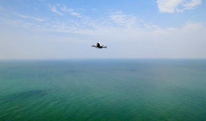 EHang EH216-Series eVTOL Aircraft Completes 1st Cross-Province Flight, Crossing Qiongzhou Strait  EHang &copy;